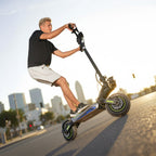 Rider on the isinwheel GT4 Dual electric scooter in the city